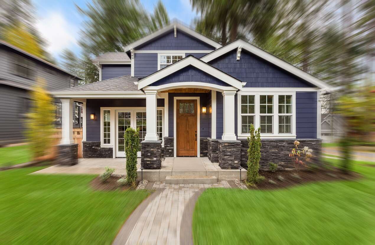 Front of a house in daylight from the perspective of someone with Bardet-Biedl syndrome. First of five stages.