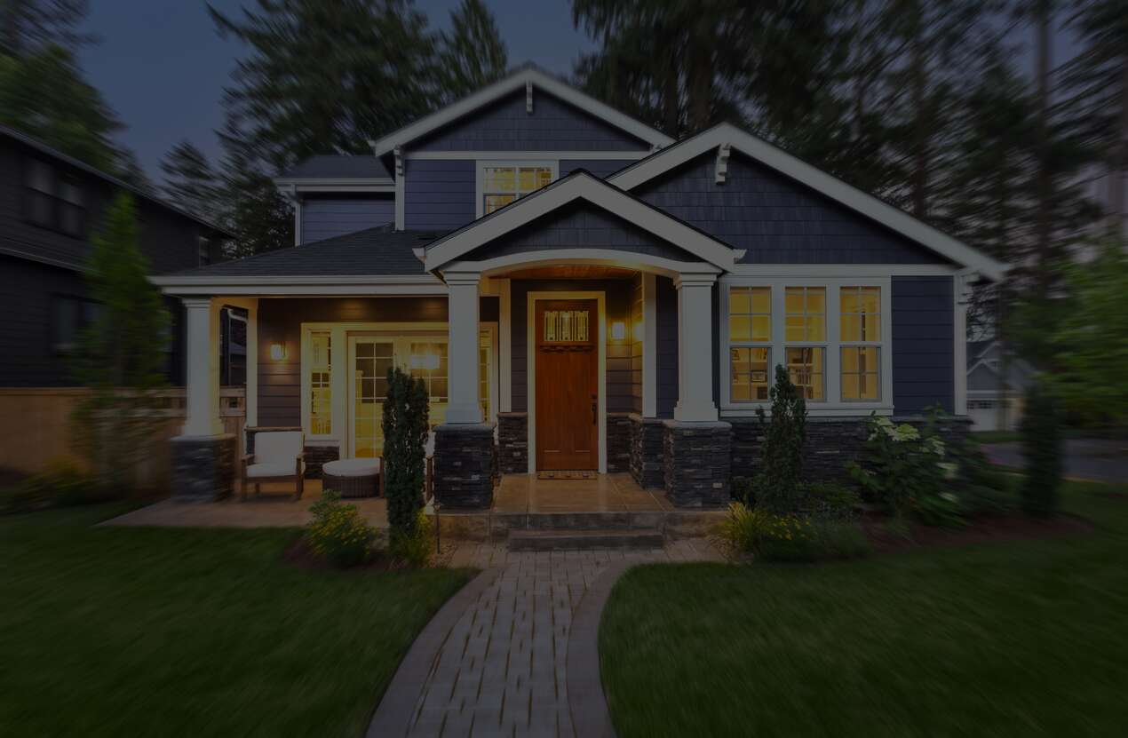 Front of a house at night from the perspective of someone with Bardet-Biedl syndrome. First of five stages.