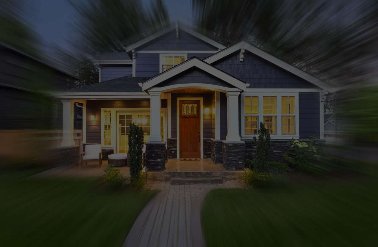 Front of a house at night from the perspective of someone with Bardet-Biedl syndrome. Second of five stages.