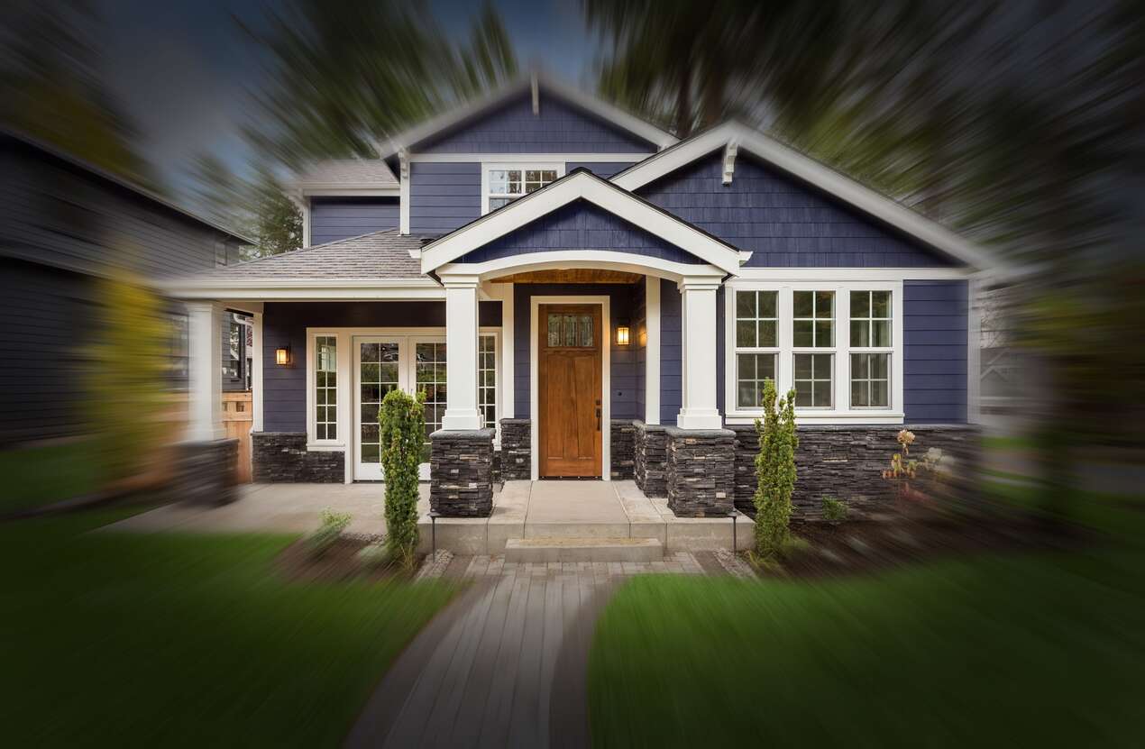 Front of a house in daylight from the perspective of someone with choroideremia. Third of five stages.