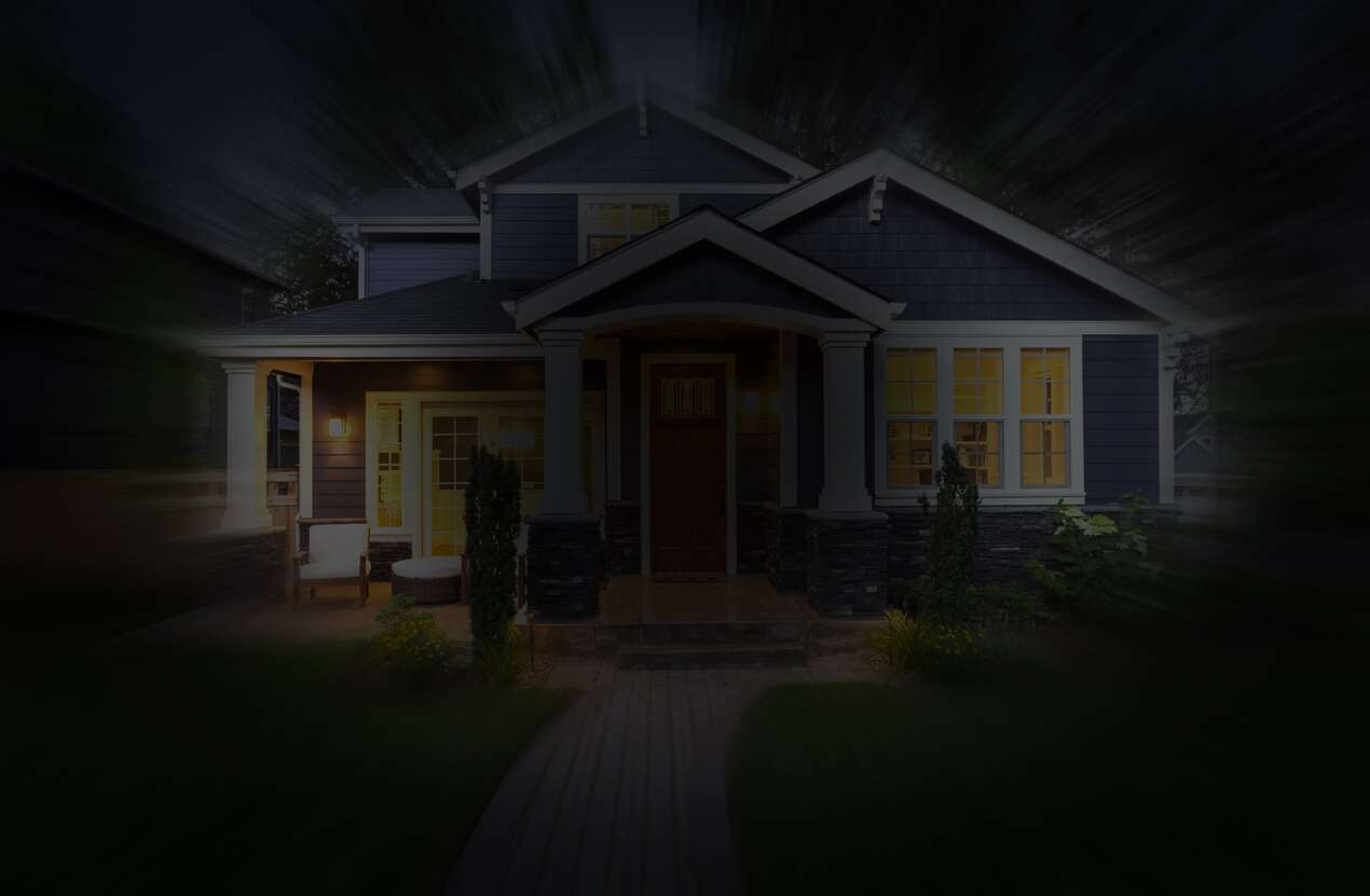Front of a house at night from the perspective of someone with choroideremia. Fourth of five stages.