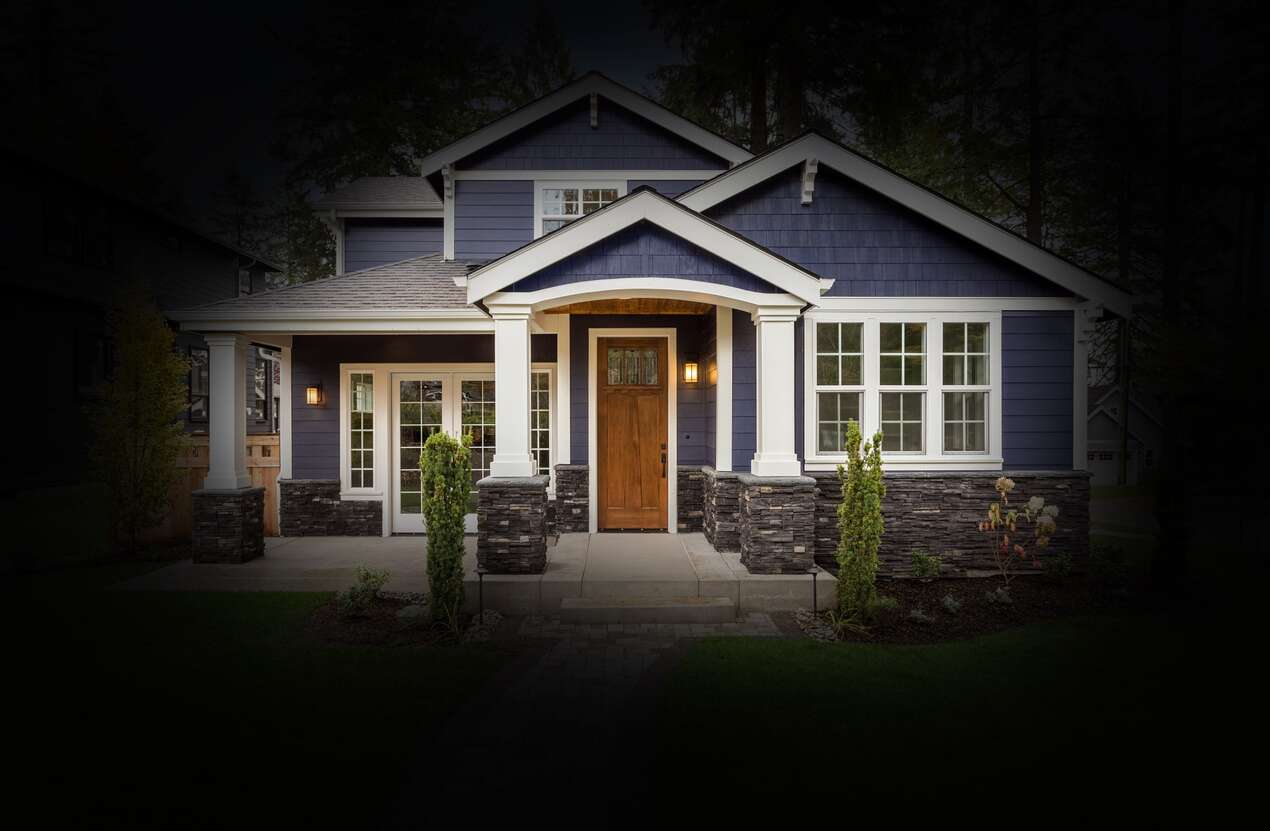 Front of a house in daylight from the perspective of someone with retinitis pigmentosa. Third of five stages.