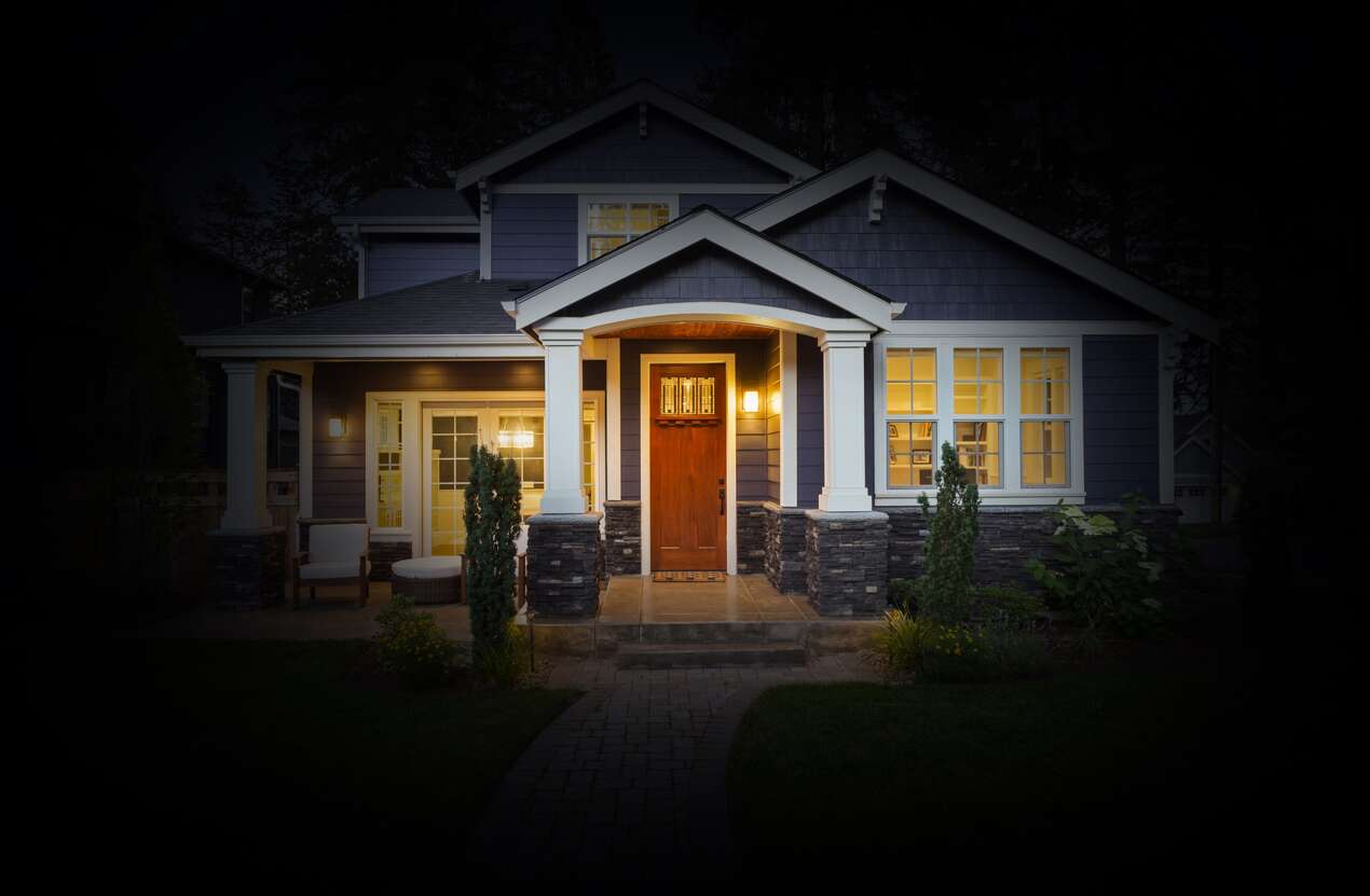 Front of a house at night from the perspective of someone with Usher syndrome. Fourth of five stages.